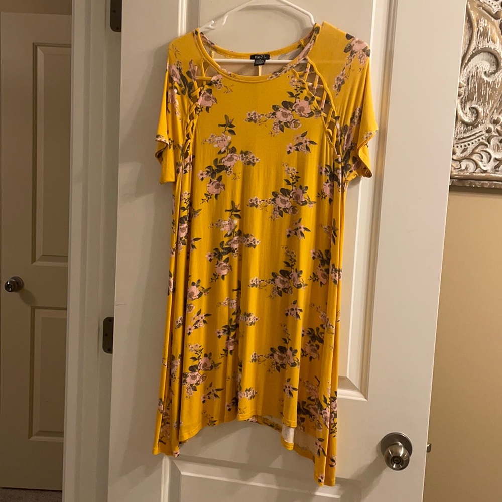 Yellow floral patterned sun dress.